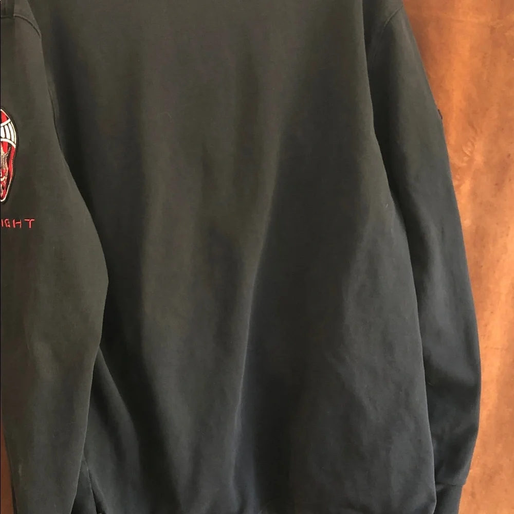 Jordan Black Long-Sleeve Polo with White Collar and Red Logos